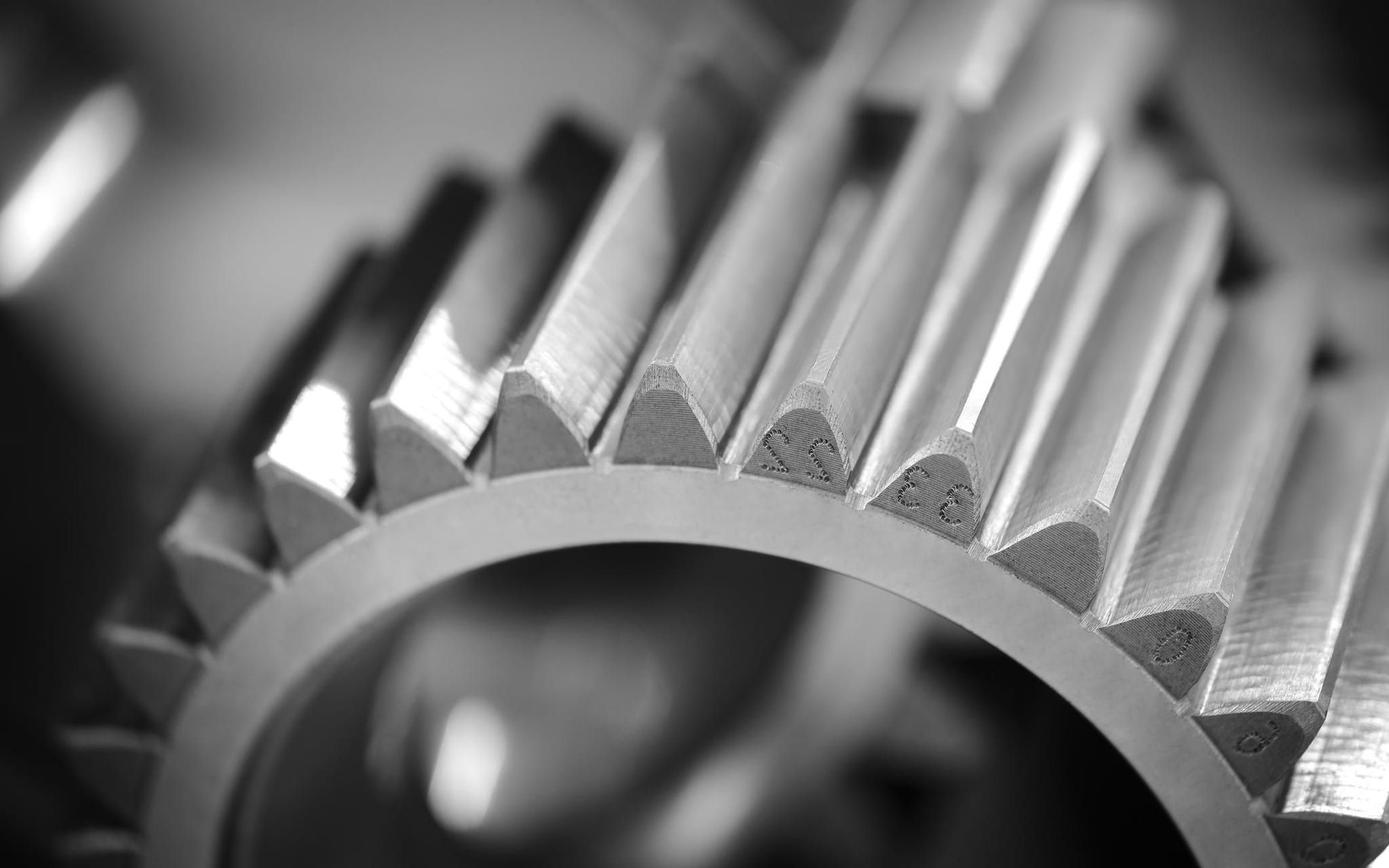 Macro photograph of a precision-machined metal gear